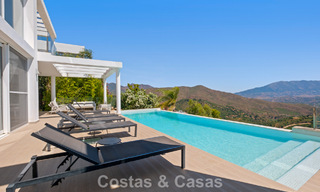 Contemporary luxury villa with sleek modern architecture and breathtaking views for sale in East Marbella 801219 