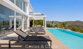 Contemporary luxury villa with sleek modern architecture and breathtaking views for sale in East Marbella 801220 