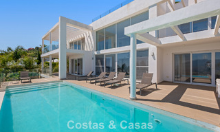 Contemporary luxury villa with sleek modern architecture and breathtaking views for sale in East Marbella 801227 