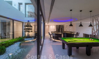 Move-in ready luxury modern villa for sale with stunning views in La Quinta, a golf community in Marbella - Benahavís 801081 