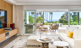 Luxury apartment with private garden and sea view for sale in Los Granados, a prestigious beachfront complex in Puerto Banús, Marbella 801891 