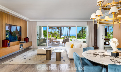 Luxury apartment with private garden and sea view for sale in Los Granados, a prestigious beachfront complex in Puerto Banús, Marbella 801893