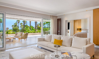 Luxury apartment with private garden and sea view for sale in Los Granados, a prestigious beachfront complex in Puerto Banús, Marbella 801896 