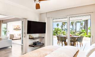 Luxury apartment with private garden and sea view for sale in Los Granados, a prestigious beachfront complex in Puerto Banús, Marbella 801897 