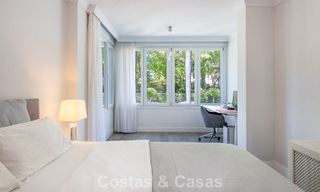 Luxury apartment with private garden and sea view for sale in Los Granados, a prestigious beachfront complex in Puerto Banús, Marbella 801900 