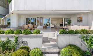 Luxury apartment with private garden and sea view for sale in Los Granados, a prestigious beachfront complex in Puerto Banús, Marbella 801901 
