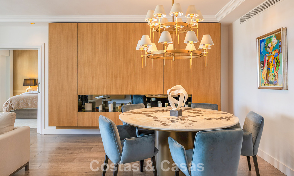 Luxury apartment with private garden and sea view for sale in Los Granados, a prestigious beachfront complex in Puerto Banús, Marbella 801902