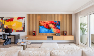 Luxury apartment with private garden and sea view for sale in Los Granados, a prestigious beachfront complex in Puerto Banús, Marbella 801905 
