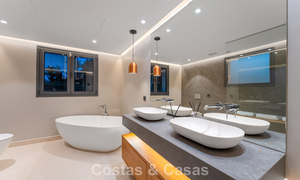 Modern luxury villa with heated swimming pool for sale in Nueva Andalucía's Golf Valley, Marbella 801952