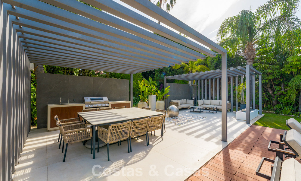 Modern luxury villa with heated swimming pool for sale in Nueva Andalucía's Golf Valley, Marbella 801953