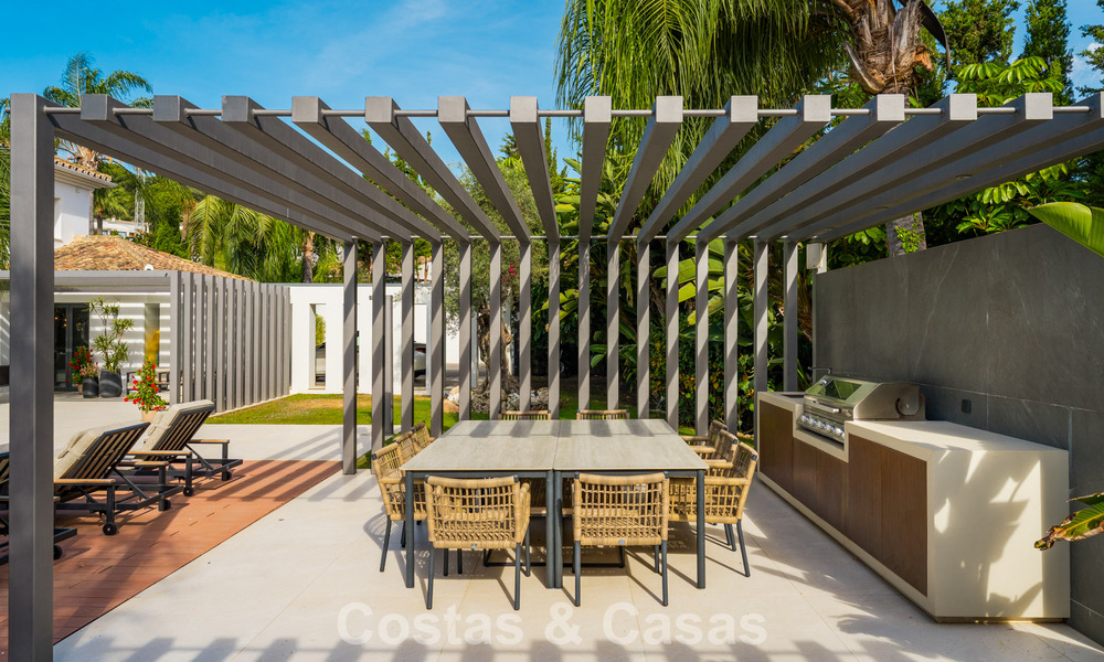 Modern luxury villa with heated swimming pool for sale in Nueva Andalucía's Golf Valley, Marbella 801954