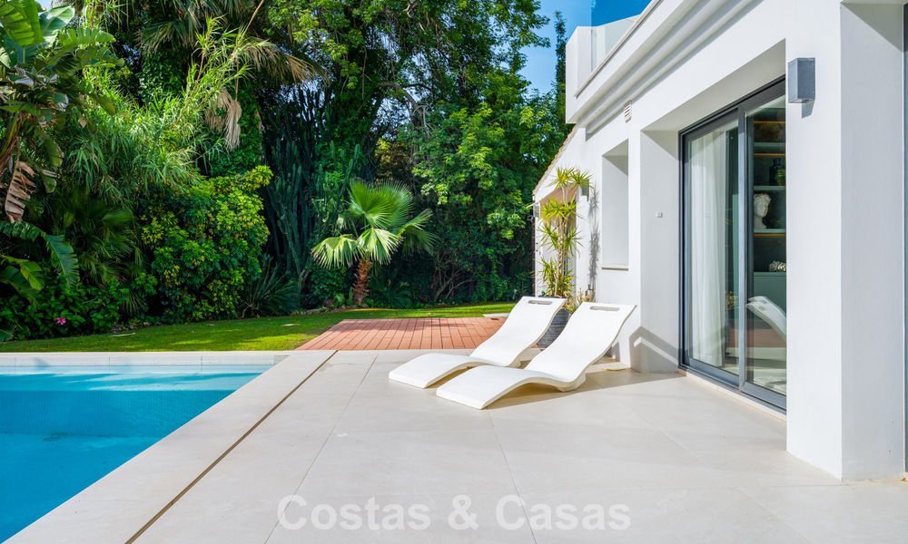 Modern luxury villa with heated swimming pool for sale in Nueva Andalucía's Golf Valley, Marbella 801956