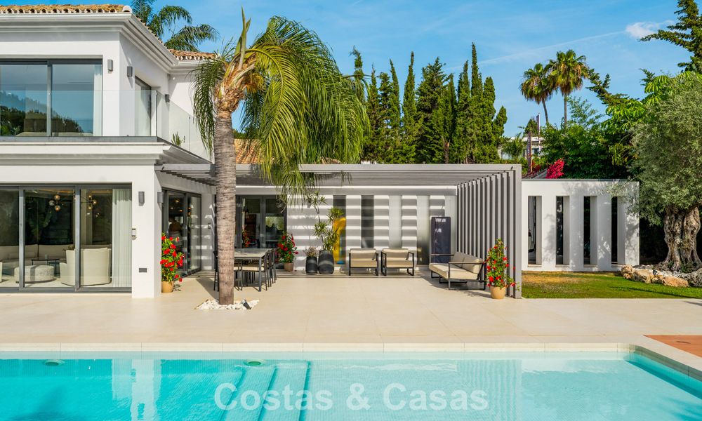 Modern luxury villa with heated swimming pool for sale in Nueva Andalucía's Golf Valley, Marbella 801959