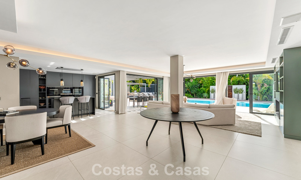 Modern luxury villa with heated swimming pool for sale in Nueva Andalucía's Golf Valley, Marbella 801964