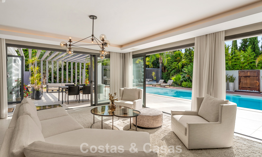 Modern luxury villa with heated swimming pool for sale in Nueva Andalucía's Golf Valley, Marbella 801965