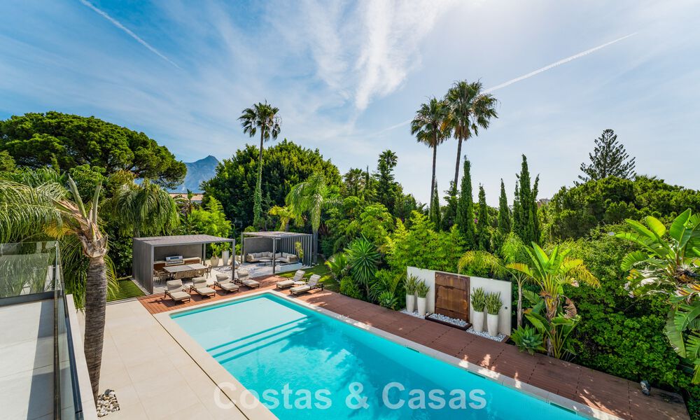 Modern luxury villa with heated swimming pool for sale in Nueva Andalucía's Golf Valley, Marbella 801990