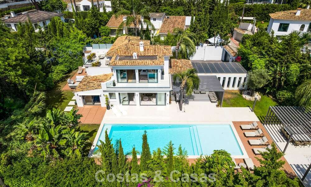 Modern luxury villa with heated swimming pool for sale in Nueva Andalucía's Golf Valley, Marbella 801996