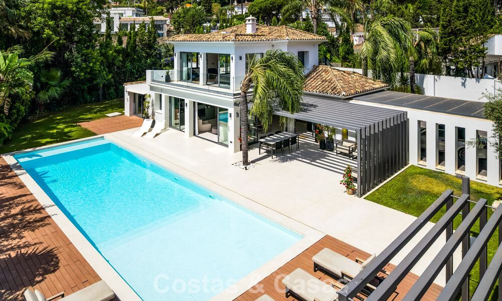 Modern luxury villa with heated swimming pool for sale in Nueva Andalucía's Golf Valley, Marbella 801998