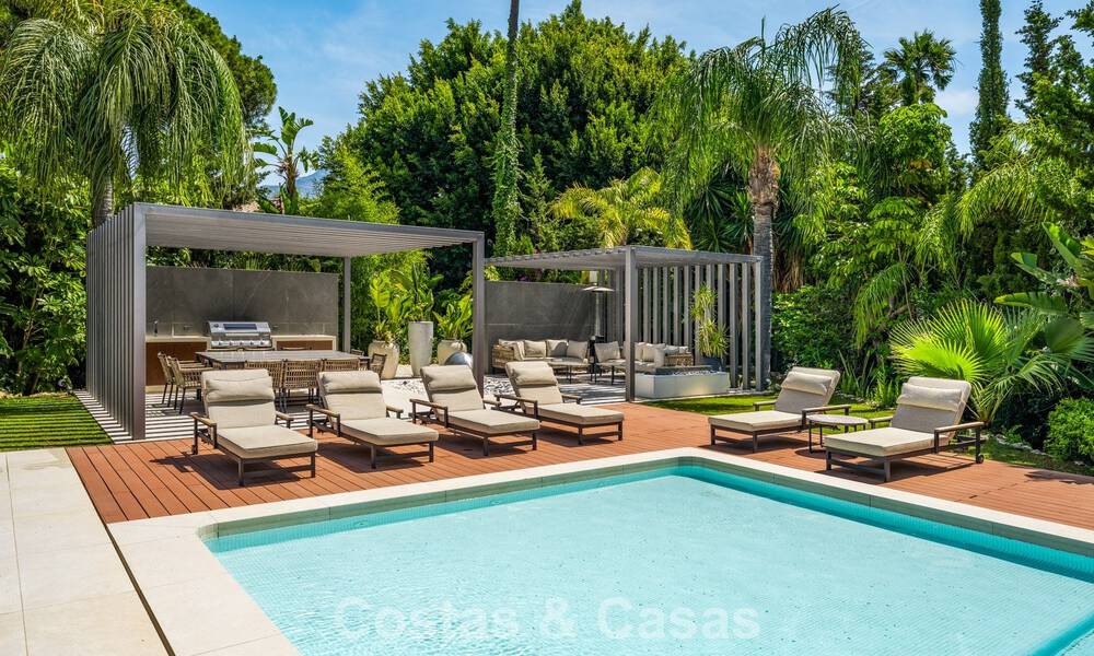 Modern luxury villa with heated swimming pool for sale in Nueva Andalucía's Golf Valley, Marbella 802001