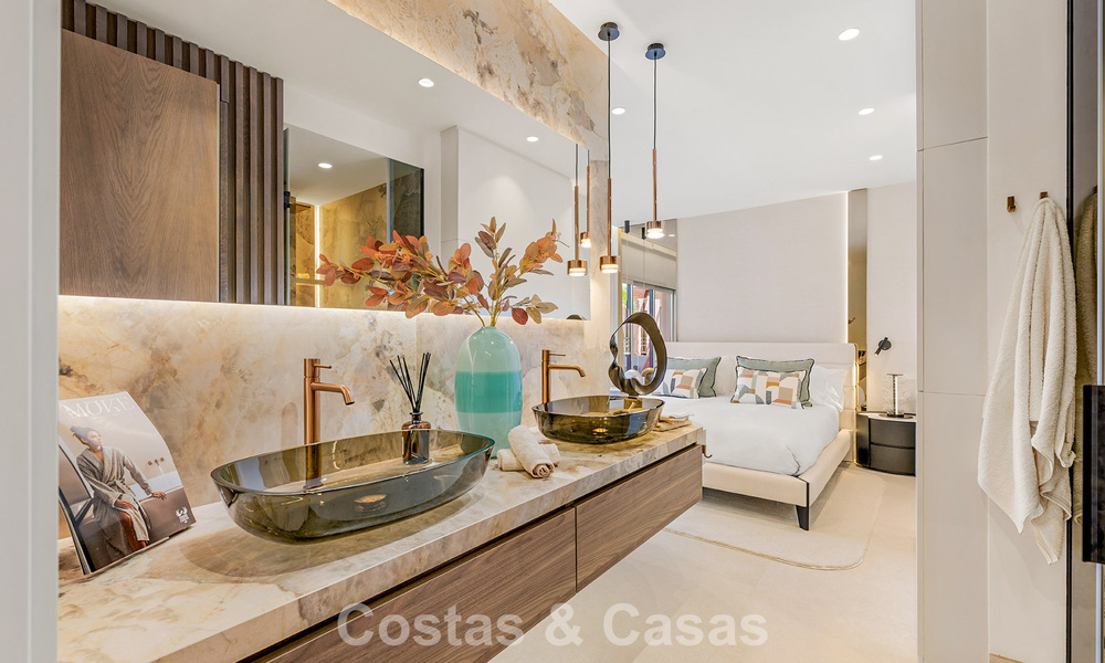 Modernised luxury beachfront apartment for sale in a prestigious beachfront development between Marbella and Estepona 802499