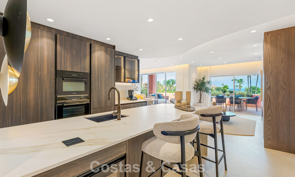 Modernised luxury beachfront apartment for sale in a prestigious beachfront development between Marbella and Estepona 802502