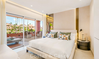 Modernised luxury beachfront apartment for sale in a prestigious beachfront development between Marbella and Estepona 802504 