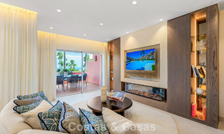 Modernised luxury beachfront apartment for sale in a prestigious beachfront development between Marbella and Estepona 802505 