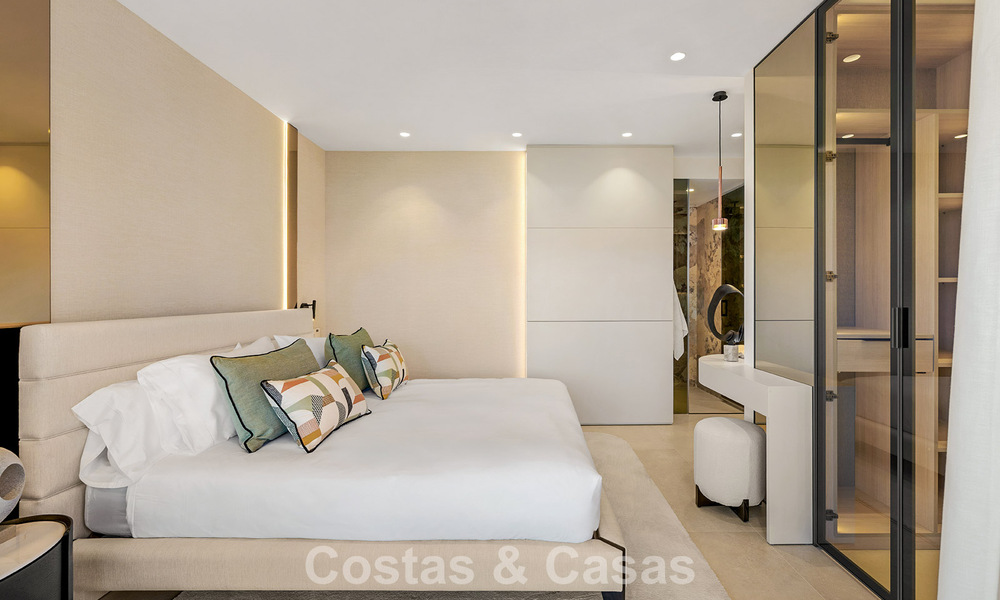 Modernised luxury beachfront apartment for sale in a prestigious beachfront development between Marbella and Estepona 802506