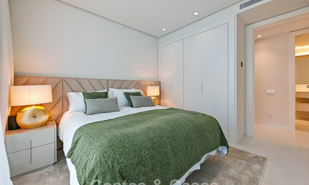 Modern garden apartment with sea views for sale in an exclusive boutique development near Marbella 802613