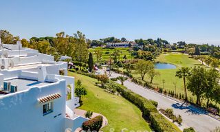 Renovated semi-detached home with frontline golf views for sale in Aloha, Nueva Andalucia, Marbella 803133 