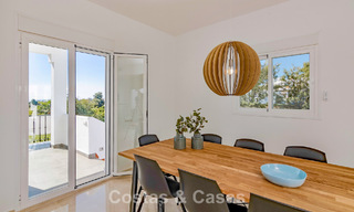 Renovated semi-detached home with frontline golf views for sale in Aloha, Nueva Andalucia, Marbella 803136 