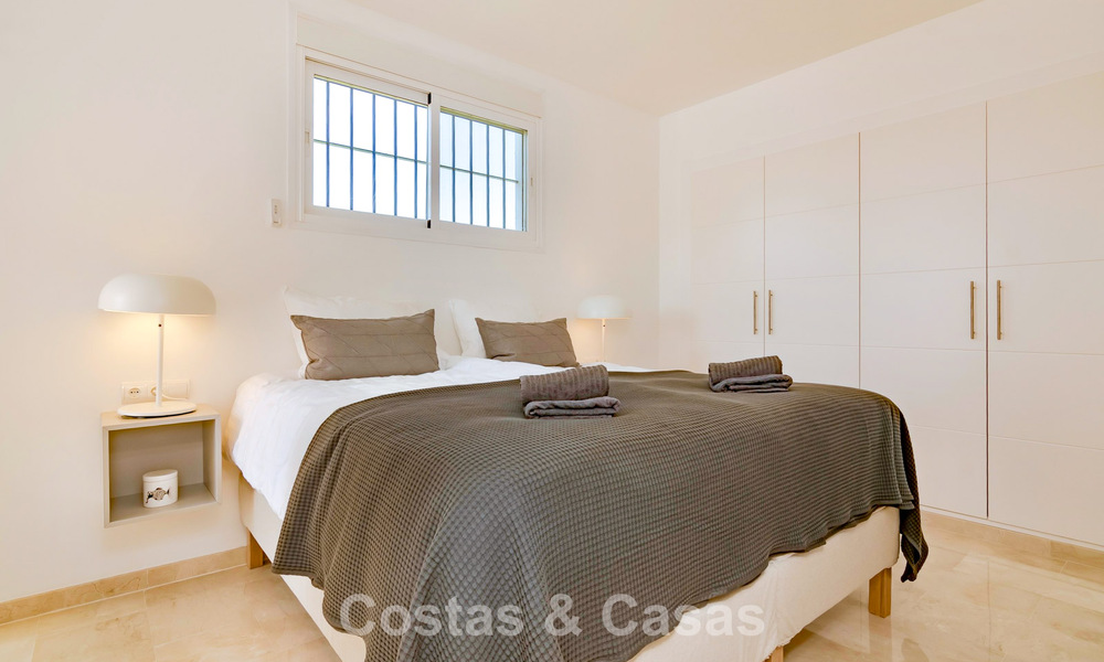 Renovated semi-detached home with frontline golf views for sale in Aloha, Nueva Andalucia, Marbella 803143
