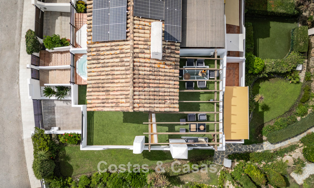 Exclusive semi-detached home with rooftop terrace for sale on Marbella's Golden Mile 803873