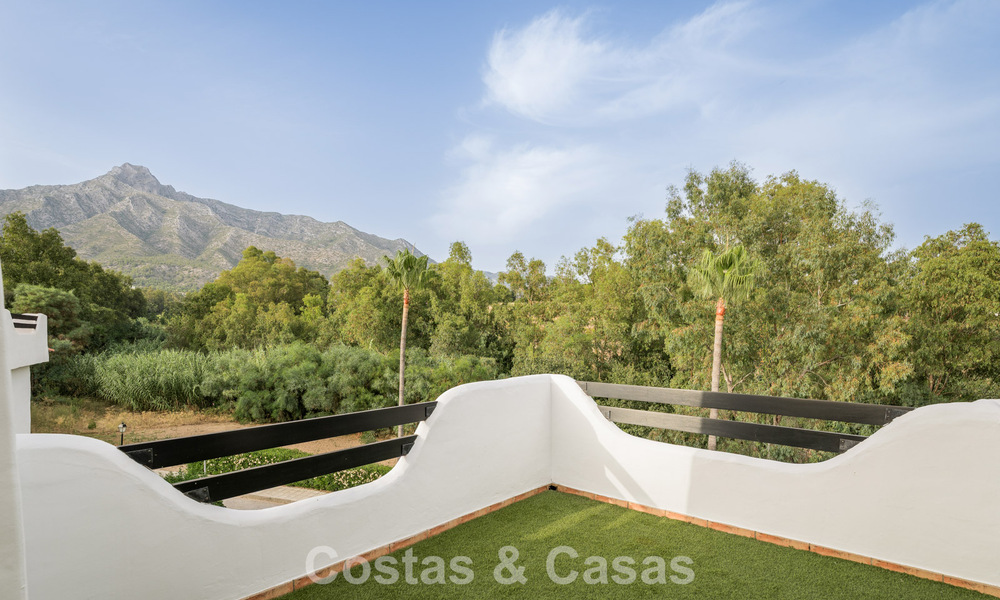 Exclusive semi-detached home with rooftop terrace for sale on Marbella's Golden Mile 803902