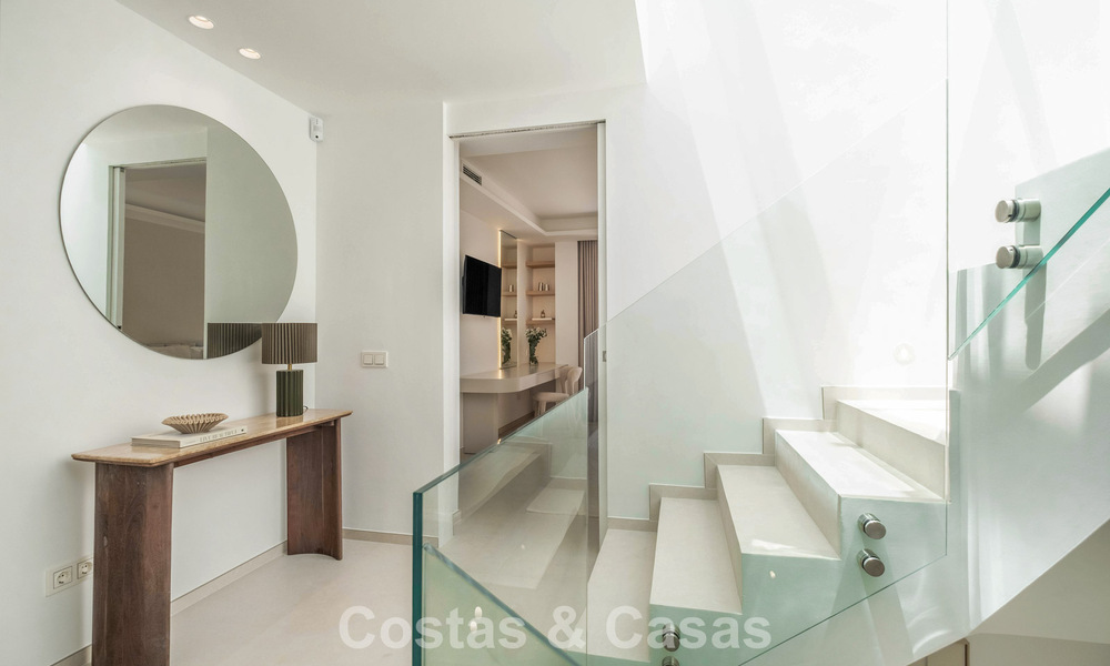 Luxuriously fully renovated semi-detached villa, frontline golf for sale in La Quinta, Marbella - Benahavís 804458