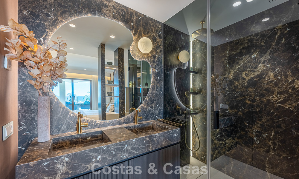 Refined designer apartment with sea views in a modern beachfront development on Marbella’s New Golden Mile - Estepona 804715