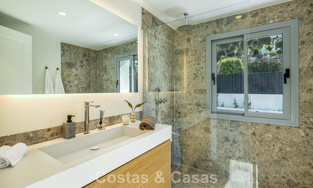 Spanish villa with a modern interior and a large garden for sale on the New Golden Mile in Benahavis between Marbella and Estepona 804846