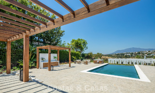 Spanish villa with a modern interior and a large garden for sale on the New Golden Mile in Benahavis between Marbella and Estepona 804860 