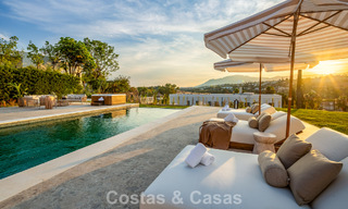 Spanish villa with a modern interior and a large garden for sale on the New Golden Mile in Benahavis between Marbella and Estepona 804870 
