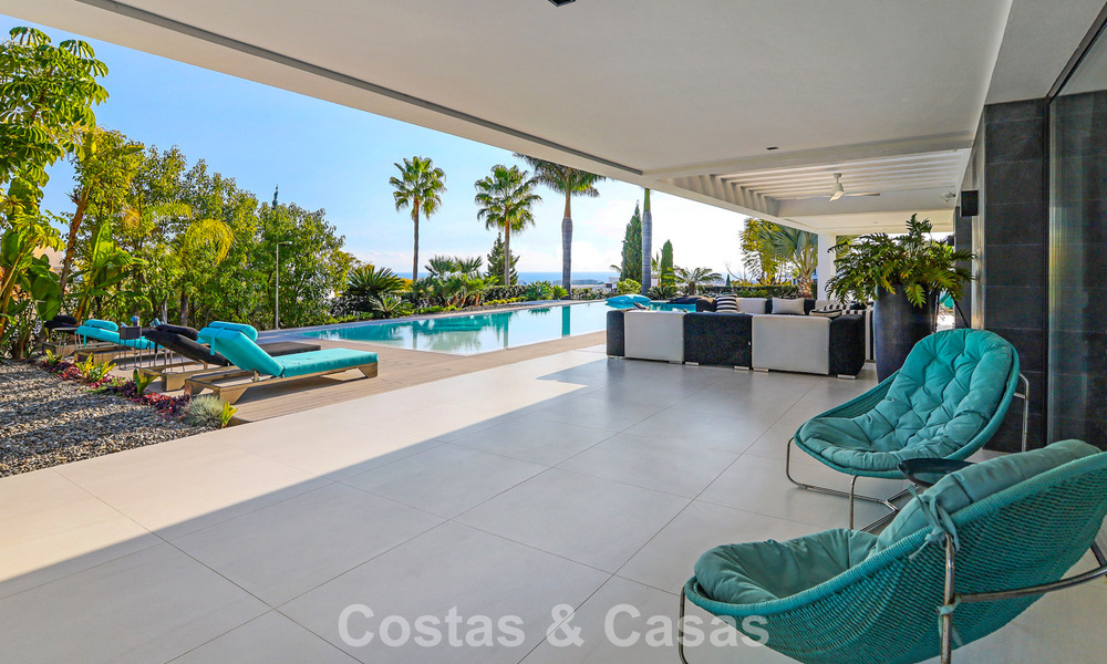 Exclusive contemporary villa with panoramic sea views for sale in Los Flamingos, a 5-Star Golf resort in Marbella - Benahavís 804755