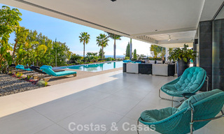 Exclusive contemporary villa with panoramic sea views for sale in Los Flamingos, a 5-Star Golf resort in Marbella - Benahavís 804755 