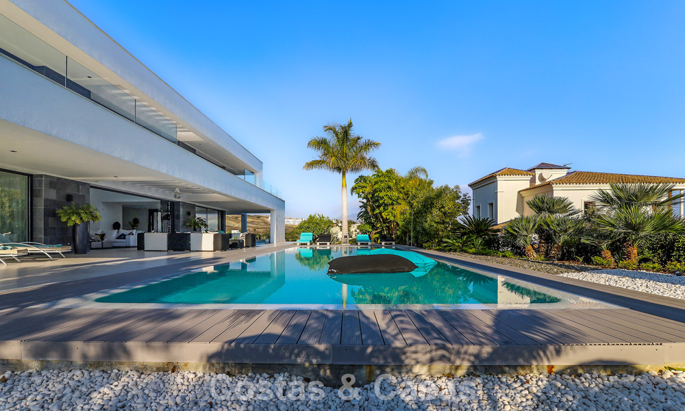 Exclusive contemporary villa with panoramic sea views for sale in Los Flamingos, a 5-Star Golf resort in Marbella - Benahavís 804757