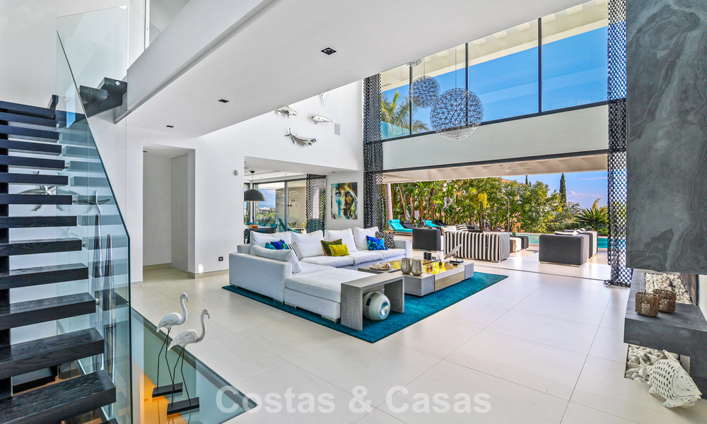Exclusive contemporary villa with panoramic sea views for sale in Los Flamingos, a 5-Star Golf resort in Marbella - Benahavís 804764