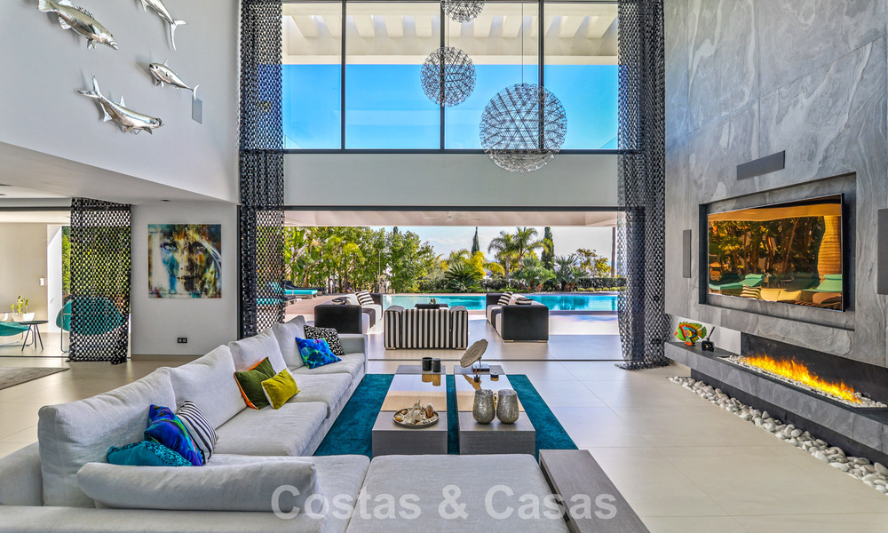 Exclusive contemporary villa with panoramic sea views for sale in Los Flamingos, a 5-Star Golf resort in Marbella - Benahavís 804765