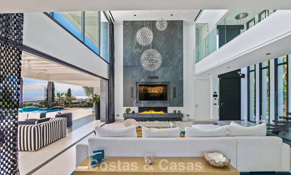 Exclusive contemporary villa with panoramic sea views for sale in Los Flamingos, a 5-Star Golf resort in Marbella - Benahavís 804767