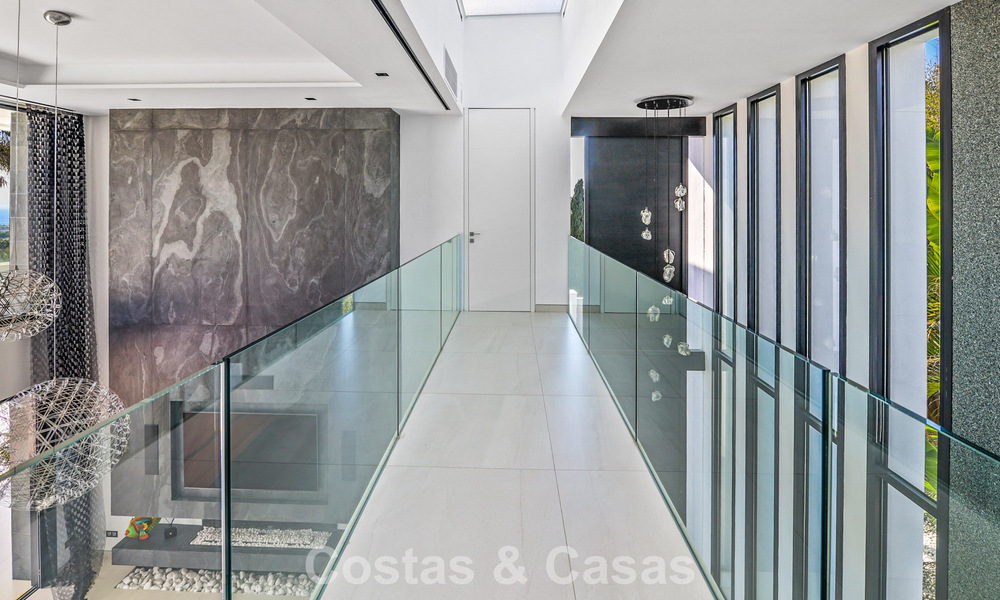 Exclusive contemporary villa with panoramic sea views for sale in Los Flamingos, a 5-Star Golf resort in Marbella - Benahavís 804776