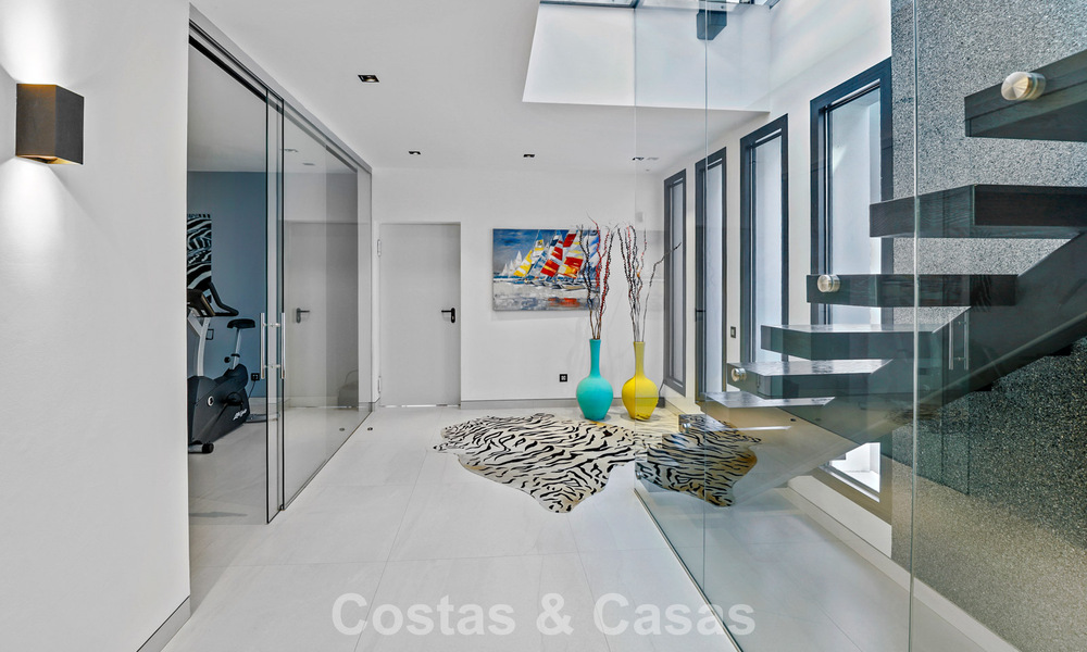 Exclusive contemporary villa with panoramic sea views for sale in Los Flamingos, a 5-Star Golf resort in Marbella - Benahavís 804785