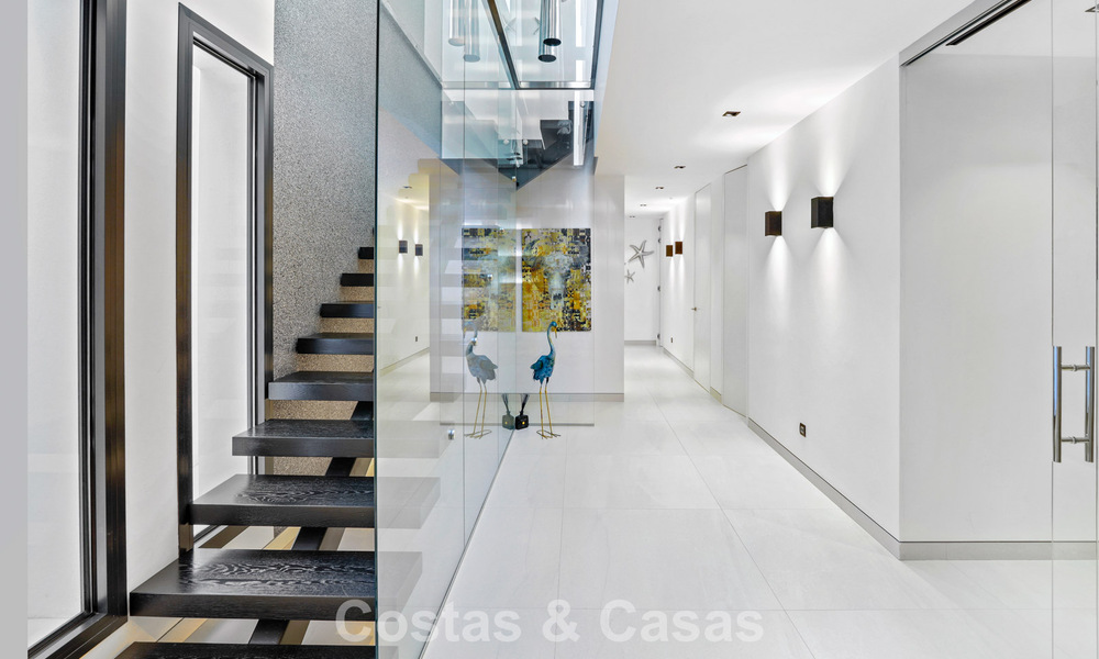 Exclusive contemporary villa with panoramic sea views for sale in Los Flamingos, a 5-Star Golf resort in Marbella - Benahavís 804787