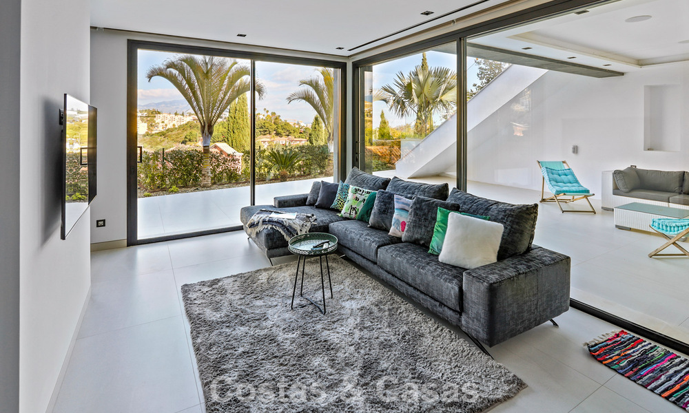Exclusive contemporary villa with panoramic sea views for sale in Los Flamingos, a 5-Star Golf resort in Marbella - Benahavís 804789