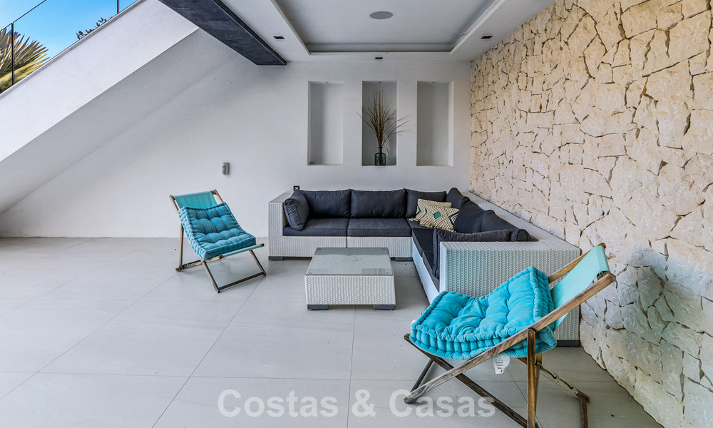 Exclusive contemporary villa with panoramic sea views for sale in Los Flamingos, a 5-Star Golf resort in Marbella - Benahavís 804794